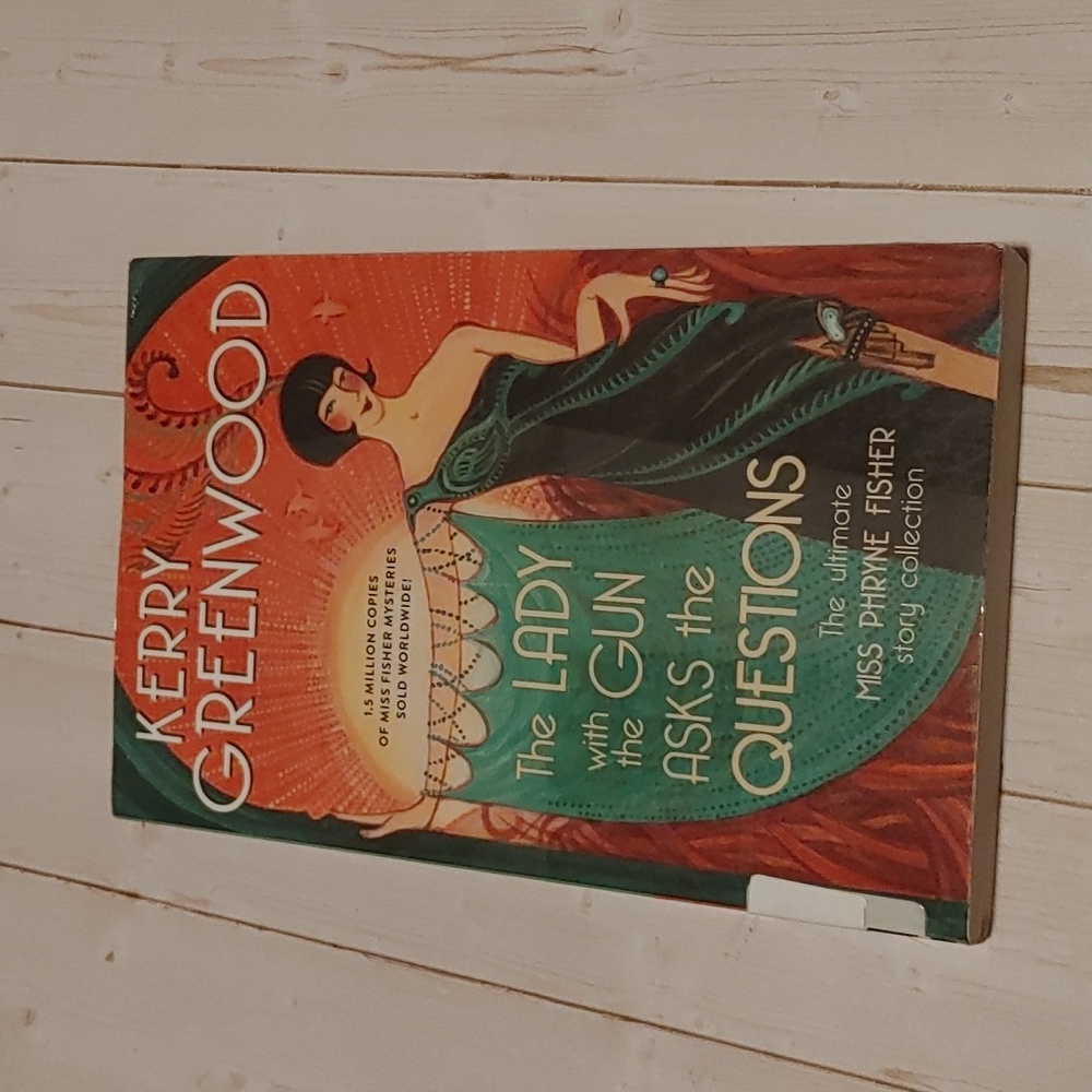 3/$13 The Lady With The Gun Asks The Questions By Kerry Greenwood Adult Book